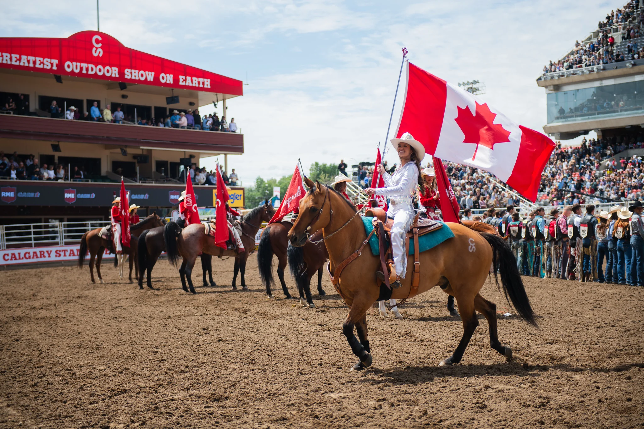 Woman rides a horse at Calgary Stampede